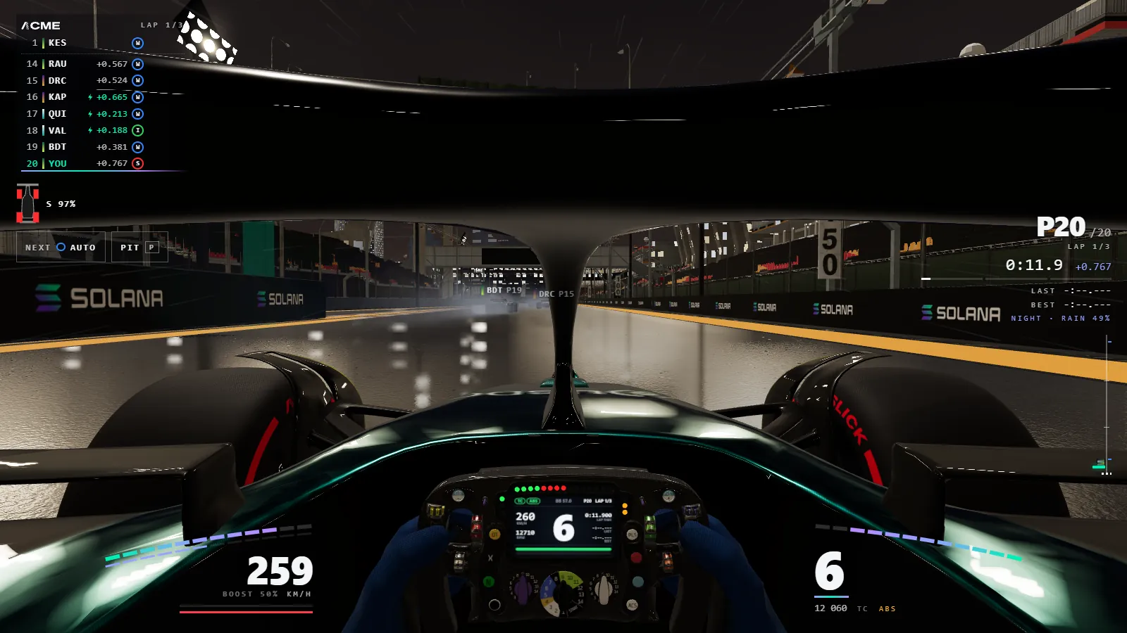 The cockpit at night in the rain: the steering wheel's screen and the mirrors