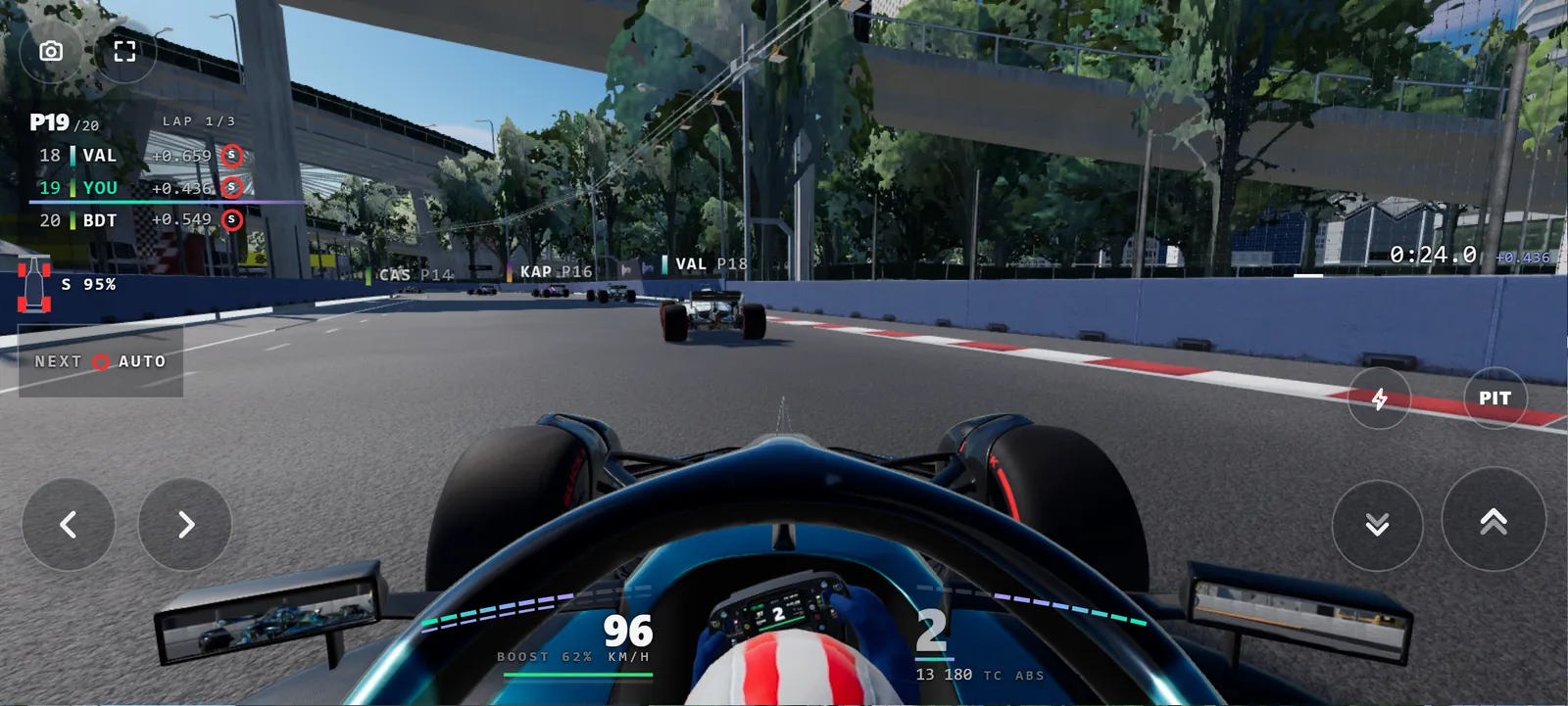 The game on a phone held sideways: the driver's view, the race display and the touch controls